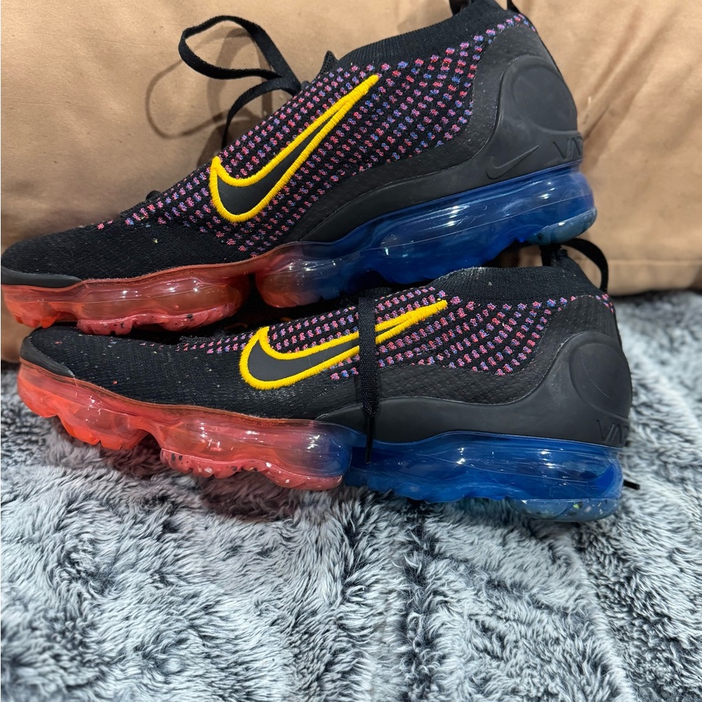 Nike Flyknit Sneakers with Black and Yellow Accents